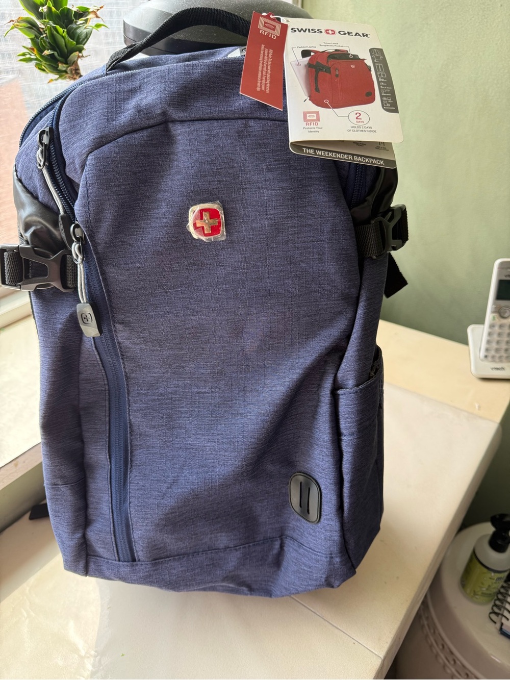 SwissGear Navy Blue Backpack with Red Logo Accent
